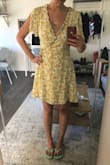 Very pleased with this dress! The material is nicer then I expected, and it's super comfy! It's cut very low in the chest area so I have to wear a tank top bra underneath it, which I expected. I wore it with my Doc Martens and got many compliments. Buy! - Kseniya L.