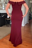 The material is so soft!! The dress is form fitting which is a style I typically stay away from but this particular dress is very flattering. I ordered it for a wedding in October and depending on the heels I wear I will have to get it hemmed. Love this dress! - Brooke V.