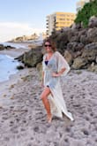 Amazing color. Beautiful dress. Doesn't make me look as thin as I could because of the dress design but I've liked wearing it. I'm 5,5 and believe I ordered a small but had to hem the bottom a few inches. :) - Stefanie P.