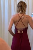 This dress is gorgeous! The color is a beautiful wine & it's so flowy when you walk. I didn't keep it because I liked another one even more! But I'll be back to buy this one for our next event for sure! - Melani P.