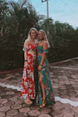 My bff and I got the same Lulus dress in both colors and we LOVED them. We wore them for a bachelorette in Mexico and it was so comfortable and flowy. It runs a little long (I got a small and I'm 5' 5''), even in my few inches heels the dress dragged some but it was perfect for the occasion. I didn't realize the green dress has two slits (on either side). Absolutely love the top too. 10/10 - Belle T.