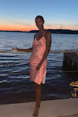 Material is silky and great quality for the price. Perfect for a wedding! Plus the color was an attention grabber! I also bought it in yellow and solid black! - Aletash W.