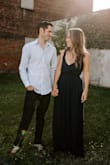 I loved this dress for engagement photos! The navy photographs so well & it's the perfect dress for spins. The dress did run long (I wore like 3 inch wedges with it so I didn't have to hem it) and the straps also seem to run long. The top ran a little big, I kept worrying I was going to flash someone. I think this could've been fixed by shortening the straps, wish they were a little shorter considering the size. Loved the dress in photos and would buy again even with the sizing! - Kayla C.