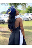 I wore this dress for my college graduation spring of 2019. This dress was very classy. Not too revealing or too tight. It had the perfect length which stopped about an inch or two above my knees. This dress was very comfortable to wear, and I also wore this without a bra which didn't reveal much. I got a lot of compliments on my dress, which was a plus. - Mia B.