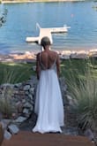 This dress blew me away! I ordered a size 4 and it fit PERFECTLY aside from being a bit to long so I got it hemmed. Quality was outstanding. I got so so many compliments. It was comfortable to wear all night long. - Melanie E.
