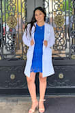 Stunning dress! Fits great and very comfortable, not too tight and not too loose. I wore it to my graduation and I definitely feel like I stood out especially in this color. If you wear a strapless bra it looks great! Got many compliments on it. I do not have any complaints about this dress! - Gabriela C.