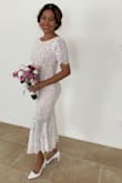 This dress fits perfectly. True to its size. Simple yet classy & timeless. I used this dress on my Civil Wedding earlier, paired it with white stilettos and simple set of pearls. Turned out just the way I envisioned and received many compliments. Customer service is great,too! Will be posting in my IG account good reviews and Lulus link and I would definitely order again. I am a one happy customer. - Marie B.