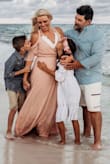 I ordered a few different dresses for our family pictures and I'm so glad I chose this one! It photographed beautifully and was exactly what I envisioned!!! It was comfortable and I loved how it flowed. It is cut a little low but I added a bralett under it and it looked stunning. I am getting tons of compliments on our pictures:) - Kelly E.