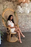 I wore this for my bridal shower and it was perfect! It was just a tad too big but I probably could have had it taken if I had time. I still wouldn't have sized down. It's not too short and is very classy looking. I received tons of compliments and was very happy with the dress. - Diane D.
