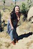 Bought this dress for my own birthday present to wear to Joshua tree. The dress is lightweight and cool. Beware, I felt like it ran large. I had to tie it as tight as it would go. I normally wear a large and have a bigger bust but I wore tape with this. - Chasity E.