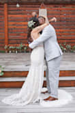 I LOVED this dress! It's elegant, romantic, and bohemian which complemented my wedding perfectly. The quality of the dress is amazing and the dainty lace train was perfect! I probably should have had it altered as it was slightly too long with 5" heels and pooled a little more than I would have liked but you can't beat the value! Highly recommend! - Aimee H.