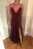 I bought this dress in a small because I have long legs and with a 2 inch heel the dress fits perfectly. It just dusts the floor so I don't even need it hemmed. I debated on getting an XS but I didn't wait to waist to feel too tight while partying at a wedding. I love the open leg slit, it makes the dress feel breathable and moveable. The color is exactly what is pictured and seemed to be perfect for a fall wedding. I also love the adjustable straps as it makes it easier to lift the 'girls'. I am not wearing a bra in the pics and the support is perfect for me. - Leora B.