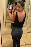 I love the open back and loose fit, with the sexy lace bottom. - Carissa B.