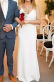 I wore this dress when I got eloped in Vegas. I couldn't ask for a better dress. The fabric was high quality and had an under layer so I didn't have to worry about it being see through with photos. I did have to get the straps taken in by a tailor but it cost under $20. I got so many compliments on this dress. I felt so pretty. - Jessica C.