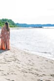 The dress came exactly as pictured and was very pretty! However the opening on top is very wide and I had issues with keeping it closed all day. I would suggest getting tape or something to help out. The dress is also VERY LONG. I got this for a beach photo shoot so it wasn't an issue, but for normal wear a person of my height would definitely need it altered. - Ashley G.