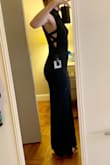 This dress is much classier than I expected. Would be suitable for a wedding, but it's a little big in the bust, so smaller chested girls may not fill it out. Also could be tricky for large chested girls too, for other reasons. Shorter girls may need to alter the hem... I'm 5'8" and it hits just about right in 3" heels. - Lauren I.