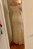 This dress is stunning. Material is high quality. It is a little heavy, so wouldn't wear to a summertime wedding, but for other seasons it's great. Flexible and comfortable for dancing, and fits wonderfully. I'm wearing 3" heels and with my height (5'8") the length is perfect. It's a little large in the chest, but I'm bottom heavy so I'll just get it altered. The pink is a little too close to white for a wedding, but otherwise perfect! - Lauren I.