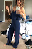 I have this in both navy and black because it is truly the perfect jumpsuit. Can dress up or down. The quality feels amazing and I love the fact I don't need a bra! - Abbie L.