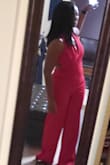This jumpsuit is gorgeous! It looks very Elegant and Sexy and the fabric is good quality. I ordered it in Red and in Emerald Green and both colors are definitely eye catchers that will have you owning any room you enter. Also, both colors are perfect for the holidays so grab one before they sell out of your size. The length was a but long due to my height but wearing high heel shoes or hemming will work. Originally I ordered a size Meduim but it was huge so I exchanged it for a size Small. The 1st size Small I received was also too big so I contacted Lulus Customer Service and explained that according to their size chart I was size Meduim which was too large and the Small was also too big. I inquired if it was possible the size Small I received could've been a defect so the representative kindly expedited me another size Small jumpsuit which fit me PERFECTLY thank God. I love both of my jumpsuits. Lulus is a reputable company, with excellent customer service, and their orders are shipped out and received very quickly. Thank you Lulus for your beautiful, classy designs and great customer service. I would order 1 size smaller based on their size chart because the fabric stretches but if you want a much looser fit stick to the size chart... - Theodora F.