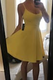 I wore this for my engagement party, I dressed it up with a waist belt. I didn't need a bra with it, beautiful material, adjustable straps. - Suzanne J.