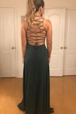 I love this dress! It's a bit long so I'll be getting hemmed and wearing it to a wedding. The colour is fabulous and the back is stunning. Great quality too! Definitely recommend it. - Amanda S.