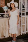 I had a tea party themed bridal shower and this dress couldn't have fit the event more perfectly. I received so many compliments. It's a thick lace which I appreciated to help me feel more comfortable. I definitely recommend. - Lyzette N.
