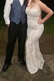 I wore for after my wedding. We went to the hotel bar and the amusement park next door.
The boning is super nice. Love the detail. It's a little long, not enough to trip over. Well worth the money. - Randi S.