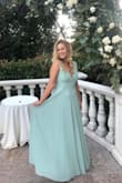 I felt like a PRINCESS in this dress! I wore it as a guest to a wedding since I would say the dress is more modest and simple. I did not expect much from it, but it turned out to be BEAUTIFUL! It flattered my shape and it was very comfortable! I definitely received a handful of compliments on it! 

I would recommend this dress! :-)

WARNING: if you are my height (5'4"), even with heels on, the dress was TOO LONG, which is why I stated that it ran a little larger. I had to spend the extra money to get it hemmed!! - Victoria M.
