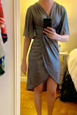 Bought this on sale, so I'm keeping it. The dress fits beautifully and the material is gorgeous. However, in certain lighting you can see entirely through the skirt (and liner) so my thighs are exposed. The liner is a little short, but I do have long legs. I plan on wearing this for date nights or other evening events, as it's too see through during daylight. - Lauren I.