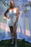 This romper/dress was very pretty I just had 2 issues with it. The first was that it is VERY sheer. In the front not so much because there is that extra layer but the back is very sheer - (even a white thong could be seen). I ended up not even wearing underwear because every single thing I tried was visible. (Kinda tmi sorry) lol. Secondly, it's very short. Mind you, I am 5'11 but I own several rompers in size L and they are all decent length. This was riding up my behind allll day and I was very uncomfortable. It is super cute though! But I do recommend ordering a size up! - Haley D.