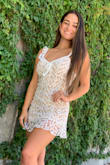 Perfect dress it is so cute in person I love the way it looks on very girly one of my best purchases, very true to size ordered a medium. - Skylar E.