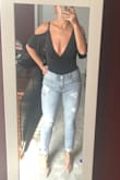 Bathing suit like material and very stretchy. Fantastic quality. Cannot wait to wear it. Yep, the skort is from this site too! - Kristina S.