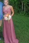 The material was great, that dress was long on me so I wore wedges. Had to safety pin the chest because it was to shower too much! - Brooklyn W.