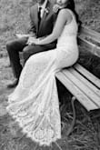 This dress is beyond beautiful, the lace is stunning! The dress was so perfect for our outdoor fall wedding at a rustic venue. I could not bring myself to spend $1000 plus for a dress that I was going to wear only one night and was skeptical ordering online but am so glad I did! It fit completely perfect right out of the bag, no alterations needed. I was struggling to find something that complemented our venue but was still a "wow" piece. This dress checked all the boxes. Our wedding day was cold ( 45 degrees Fahrenheit) and this dress allowed me to somewhat layer up with undergarments. I topped the dress with a faux fur shawl for added warmth. The amazing quality was absolutely worth the price and I couldn't be happier with my dress! - Codie A.