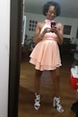 The dress was perfect! Very good quality material. It looks fantastic when all the wrinkles are steamed out. (Took mines to the cleaners before I wore it) you could twirl in this dress all night. I got so many compliments. I didn't have to wear a bra so I was FREEEE all night. Lol!! It also glows in blacklight!! - Kamilah W.