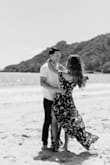 I wore this for my engagement photo shoot on the beach. I loved the way it flowed outdoors with the breeze and the slit was a beautiful touch! Definitely need an extra pair of hands to tie the top successfully! Super light and airy with pretty little details. - Laura S.