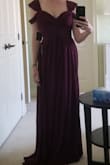 This dress fits nice and snug in the ribs, which makes it supportive in the chest. I had to shorten the straps and hem, but then it was perfect! The material is high quality and the colour is a rich purple-ish burgundy. I ordered size small. - Erin C.