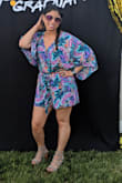 I loved wearing this romper at my grad party recently! It was the perfect height and fit for me. The colors were absolutely beautiful and vibrant and was made out of a great material. Definitely a must buy. - Janet R.
