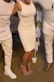 This is the best dress I've ever owned. I wore it to the White Party I threw for my birthday and got a ton of compliments. It's a perfect fit (true to size) and the back has some boning/wiring on the bottom so it maintains its shape (but is super comfortable.. I have a short torso and the low back was still perfect. Though if you're short generally (and I'm 5'3) the dress itself may feel a little long (I had to hem mine quickly about 2"). Recommend!! - Katie L.