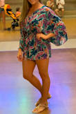 Love this romper. Super colorful, light and and flowy. One minor issue - careful washing- even with hang drying, it shrinks a bit if you wash it in the washing machine so I find myself pulling at the fabric before hang drying. This is actually my SECOND of this romper bc my first one I accidentally put in the dryer and it turned into basically a child size medium! I loved it though, so I bought another - just have to be careful/hand wash, so be mindful of that when buying. - Katie L.