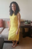 I just bought this dress and wore it for Easter, the color is great, it fits like a glove... and due to being short it fits a little longer, but that make it's more elegant. It's a GREAT DRESS! I bought the blue one also. I would very much recommend to buy it. - YURANY N.