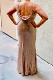 After reading just about all of the reviews, I decided to purchase the champagne colored dress (which, lets be honest, it's truly a rose gold color to die for!!) for a military ball. I was hesitant because I needed a bigger size than what most of the reviews were.  The dress arrived and fit perfectly. I wore spanx underneath and was even able to wear a strapless bra (I just lowered the back strap a little so it wasn't visible). The zipper on the left side sticks a little, due to the sequins and fabric, but it works. The material is stretchy and moves with you.  Some sequins do fall off, but it is not noticeable on the dress though.  I also purchased the shoes to match (LOVELINESS ROSE GOLD ANKLE STRAP HEELS Lulus Style 539607). Wearing the shoes with the dress, at my height, the dress didn't need any alterations!! I'm so in love with this dress and received SO many compliments! I'll definitely be back to get this dress in the navy color! - Jocelyn C.