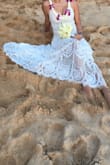 I bought this dress as a beach wedding dress. It fit perfectly. I loved the little train on it. The price was more than fair and perfect for a beach wedding as I was not afraid to âmess this dress. The dress is made nicely. I truly loved my wedding dress. I felt pretty. - Ruby S.