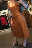 The fabric is gorgeous, and the mid calf length is perfect for me. But unfortunately, the fit is awkward and needs fixed. There is a lot of extra space around the upper chest area, and some extra fabric at the lower back that causes bunching. It does fit me decently well in the hips. I would return and get a smaller size, but it will probably fit better if I just have it tailored instead anyway, so I suppose I'll keep it. - Rebecca L.