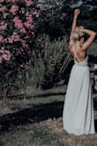 I wore this for my engagement session. I pondered for weeks what dress to get- I just couldn't find my "vibe". This was actually my last add online, and ended up being my favorite dress! I received so many compliments! And it even withstood playing in the ocean at the end of our session. Dry cleaned like a dream. - Tracy K.