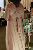 This dress is beautiful!! Perfect for brides maids. There are so many ways to tie it you can definitely find a way that flatters your body. The fabric was a nice thick weight and has a built in slip. I didnt even have to wear spanks. Packed well for a destination wedding and we got so many compliments! I am 5'10" and it was the perfect length with flats. - Melissa M.