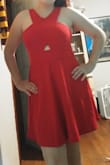 The material is nice and thick, but comfortable. It was a little loose around the waist, but I feel like a size down would've been too small so I got the XL. I was able to put a strapless bra under it without it showing too easily. I would recommend it. - Mariah H.