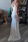This dress fits like a dream!! I got it for my wedding and I can't wait to wear it! Don't look anywhere else. This dress makes you look like a million bucks! Seriously! I was worried about my weird boney and odd uneven areas and it perfectly hides everything! Also can't tell I don't have a bra on.. big plus for me! - Leslie D.