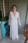 I am a curvy girl who thought no way in heck this dress would fit I usually wear a Large but after reading the size chart got XL and it fit near perfect. Not much stretch on the waist so check your measurements! I will need to get a special bra (the photo I attached I am not wearing one) so expect more lift then pictured. It is a bit loose in the arms which is a easy and cheap fix. Paid 76 total you just cant beat this wedding dress. So happy! - Kristen K.