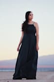 I used this dress for my engagement pictures. It was the prefect color. It was a little long and a lot  larger in the bosom area for me, but it hides a strapless bra well. - Joan C.